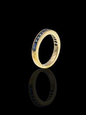 Funky Sapphire Half Eternity Ring