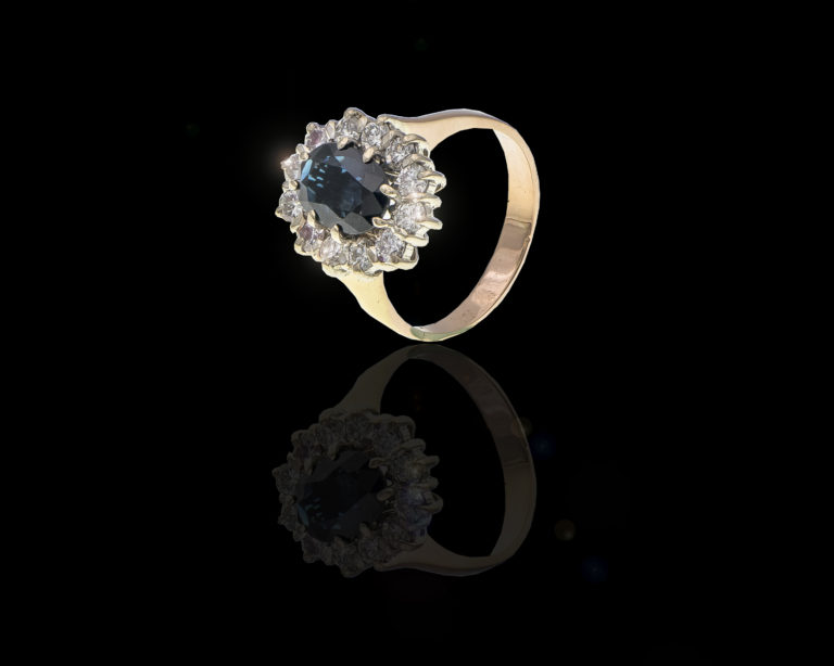 CI0001468 - 3.8 grams 14 carat Yellow Gold Sapphire and Diamond Halo Ring