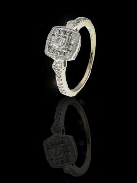 3.8 grams 18 carat White Gold Browns Diamond Halo Ring