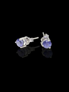 1.8 grams 18 carat White Gold Tanzantie Stud Earrings