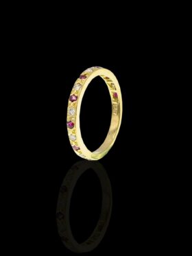 2.5 grams 18 carat Yellow Gold Diamond and Ruby Half Eternity Ring