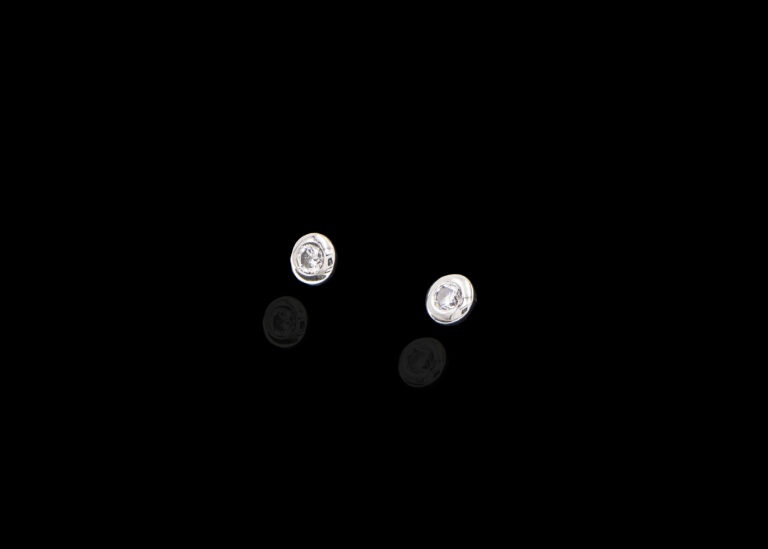 1.6 grams Platinum and 9 carat White Gold Diamond Stud Earrings