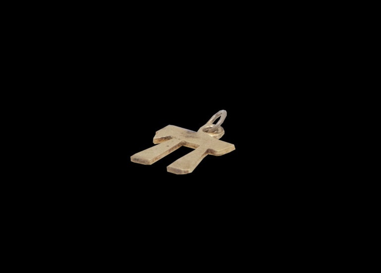 0.6 grams 14 carat Yellow Gold Chai Charm