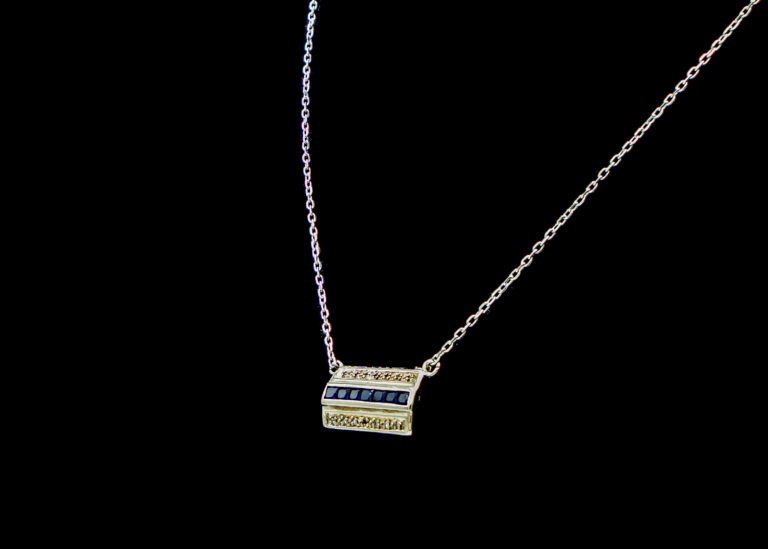 7.1 grams 9 carat White Gold Gem & Diamond Pendant with a Platinum Chain