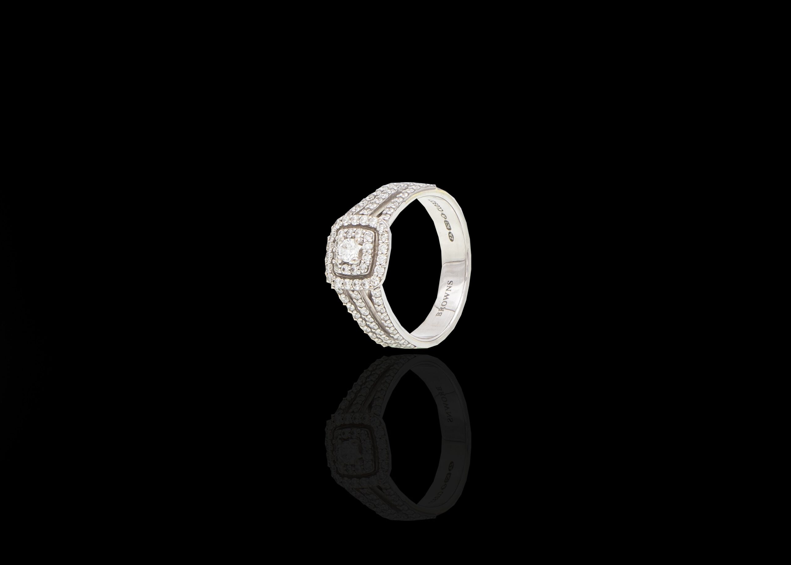 5.7 grams 9 carat White Gold Diamond Brown's Illusion Set Ring