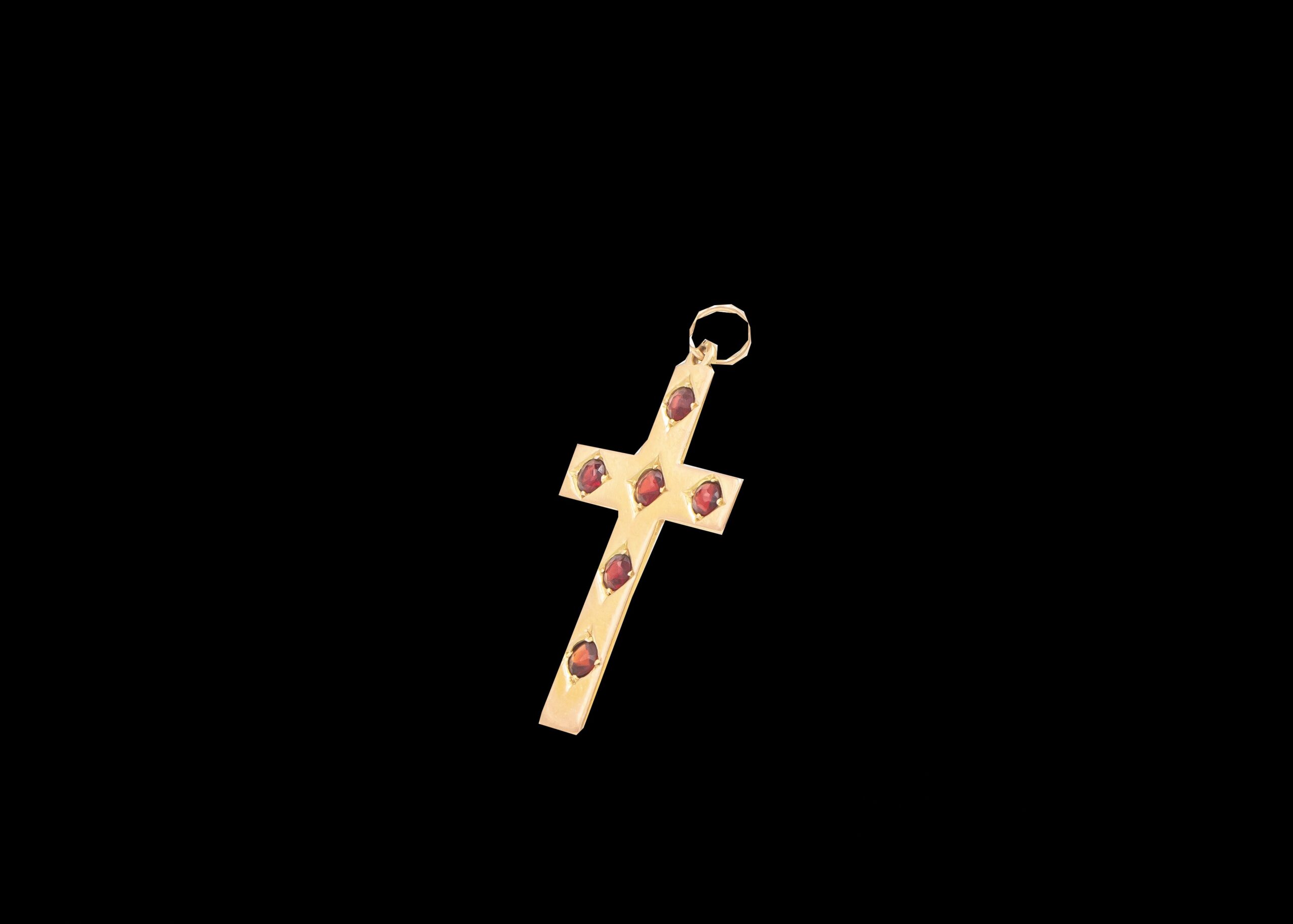 2.4 grams 15 carat Yellow Gold & Garnet Cross Pendant