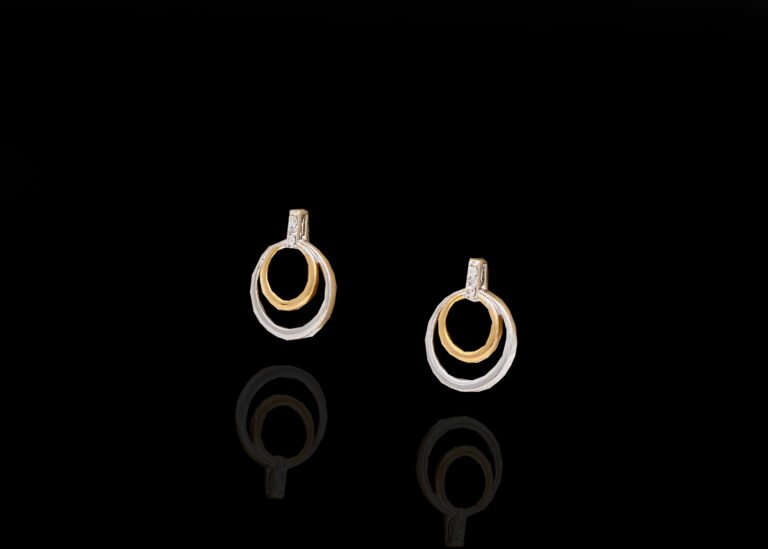 1.4 grams 9 carat Two Tone (white & Yellow) Gold Diamond Stud Earrings