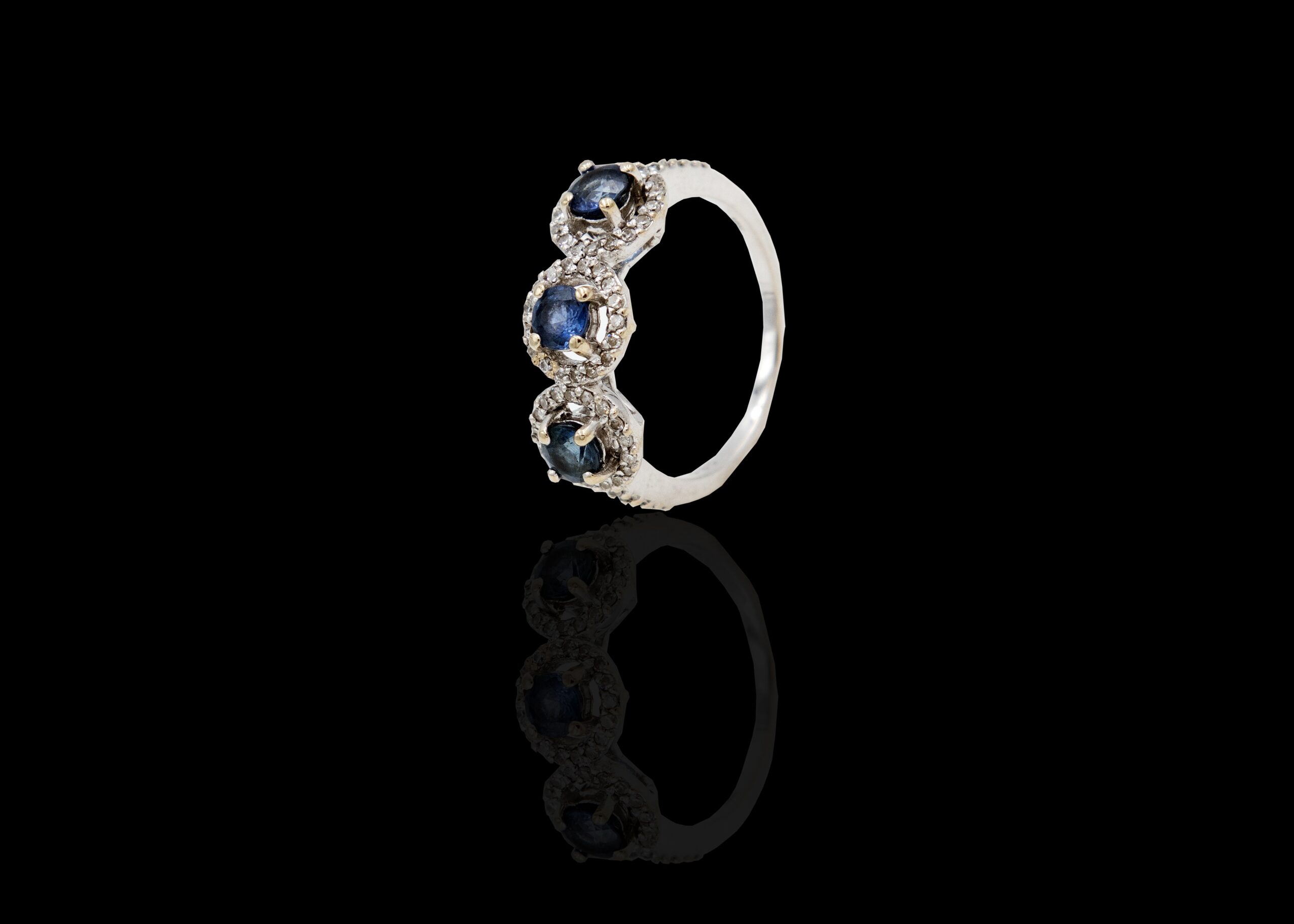 CI0002066 - 3.8 grams 9 carat White Gold Tanzanite & Diamond Trilogy Ring