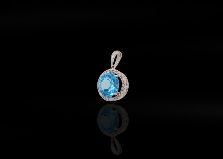 CI0002166 - 1.2 grams 9 carat White Gold Gemstone & Diamond Pendant