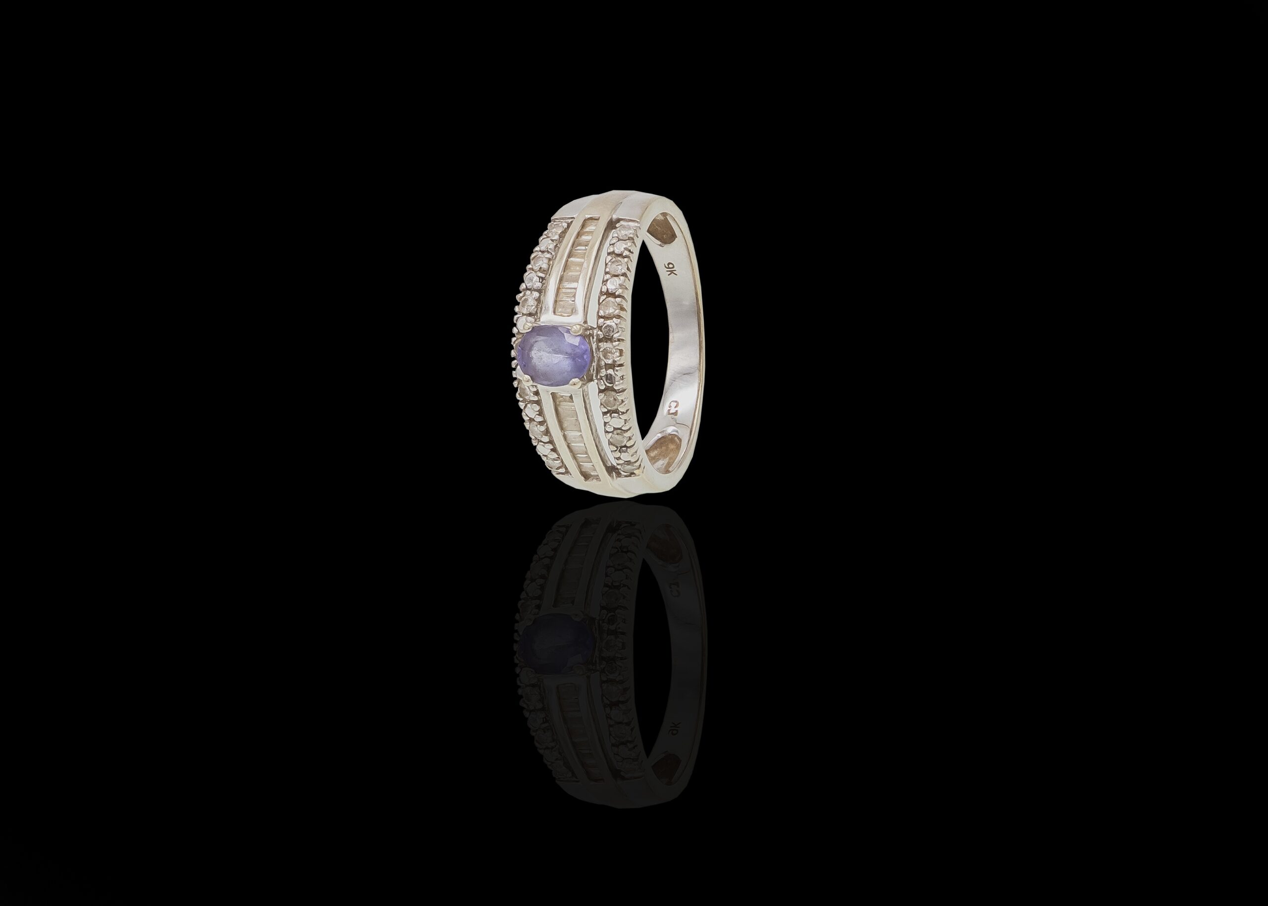 CI0002202 - 3 grams 9 carat White Gold Tanzanite and Diamond Cocktail Ring