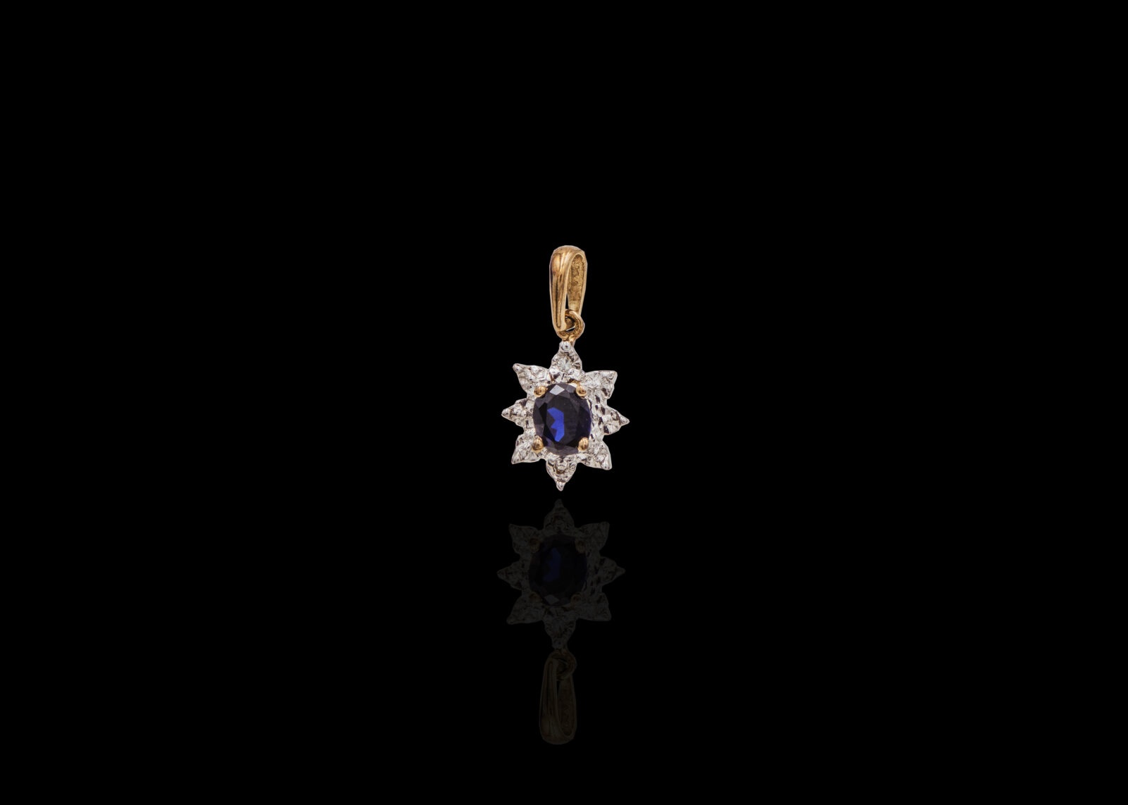 CI0002246 - 0.6 grams 9 carat Yellow Gold Gemstone Illusion Set Pendant