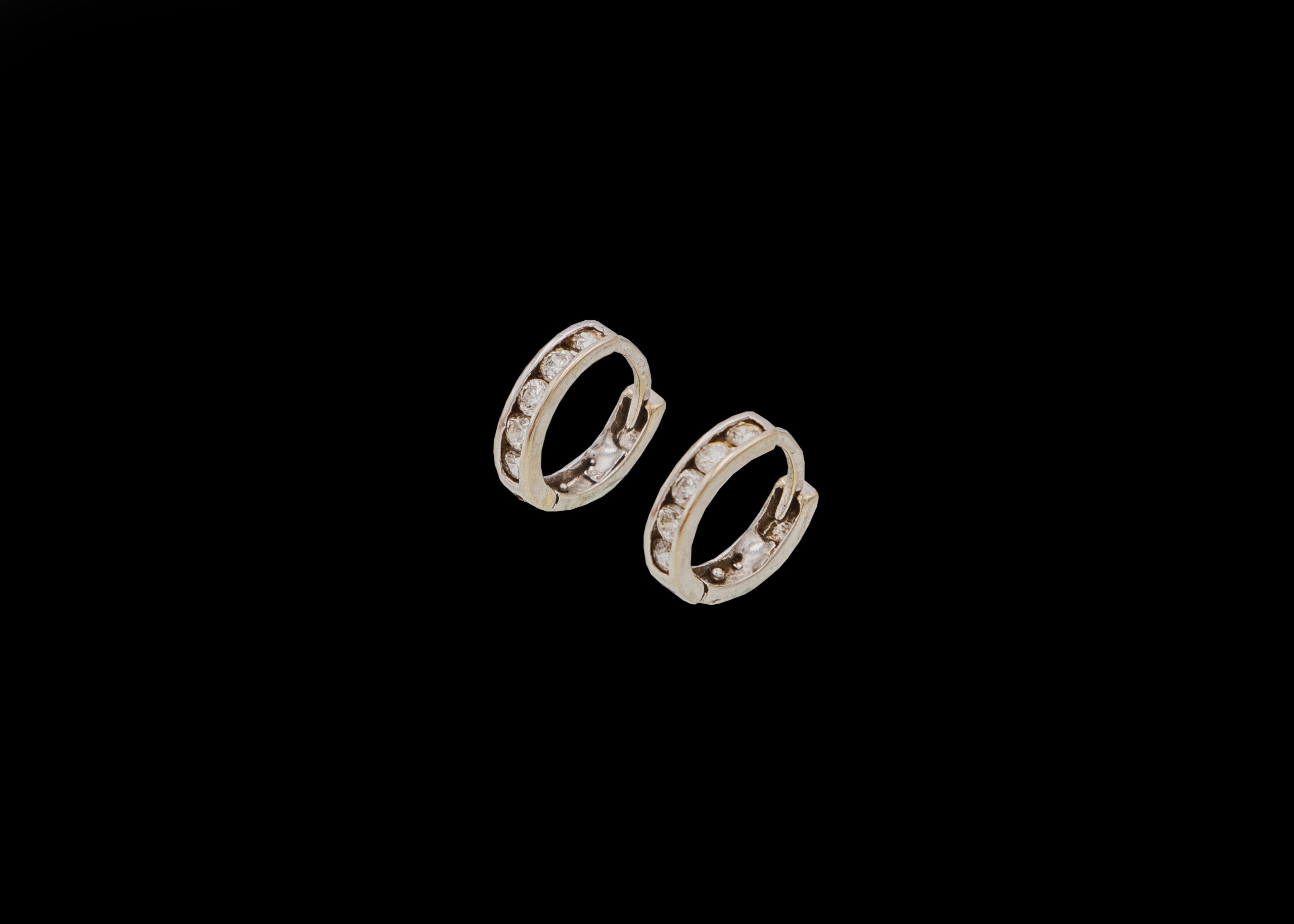 CI0001258 - 1 gram 9 carat White Gold Zirconia Huggy Earrings