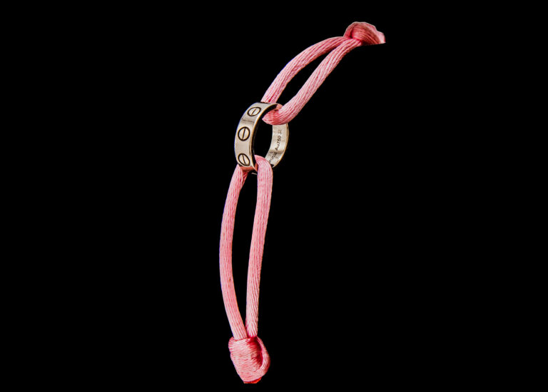 CI0001360 - Approximately 2 grams 18 carat White Gold Cartier Love Pink Cord Adjustable Bracelet