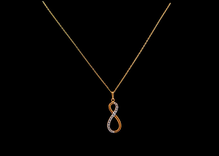 CI0001374 - 1.1 grams 9 carat Yellow Gold Chain and Zirconia Pendant