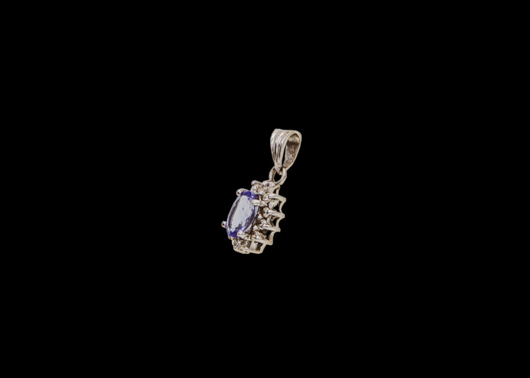 CI0001388 - 0.8 carat 9 carat White Gold Tanzanite And Diamond Pendant