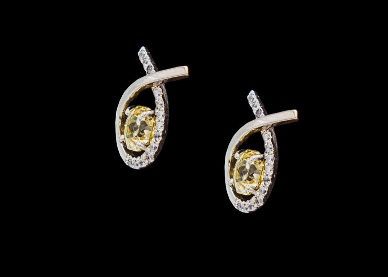 CI0001396 - 4.8 grams Platinum Gemstone and Diamond Stud Earrings