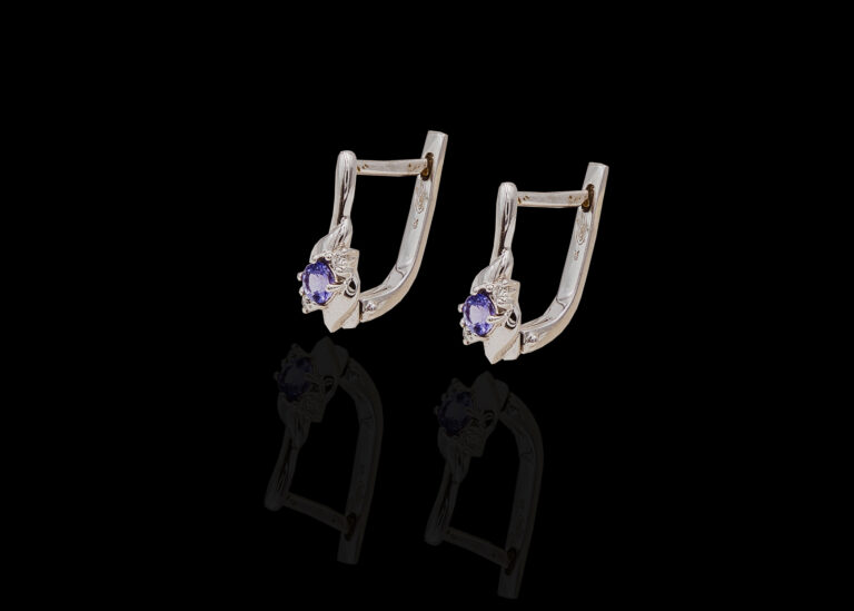 CI0001120 - 2.5 grams 9 carat White Gold Tanzanite and Diamond Huggy Earrings