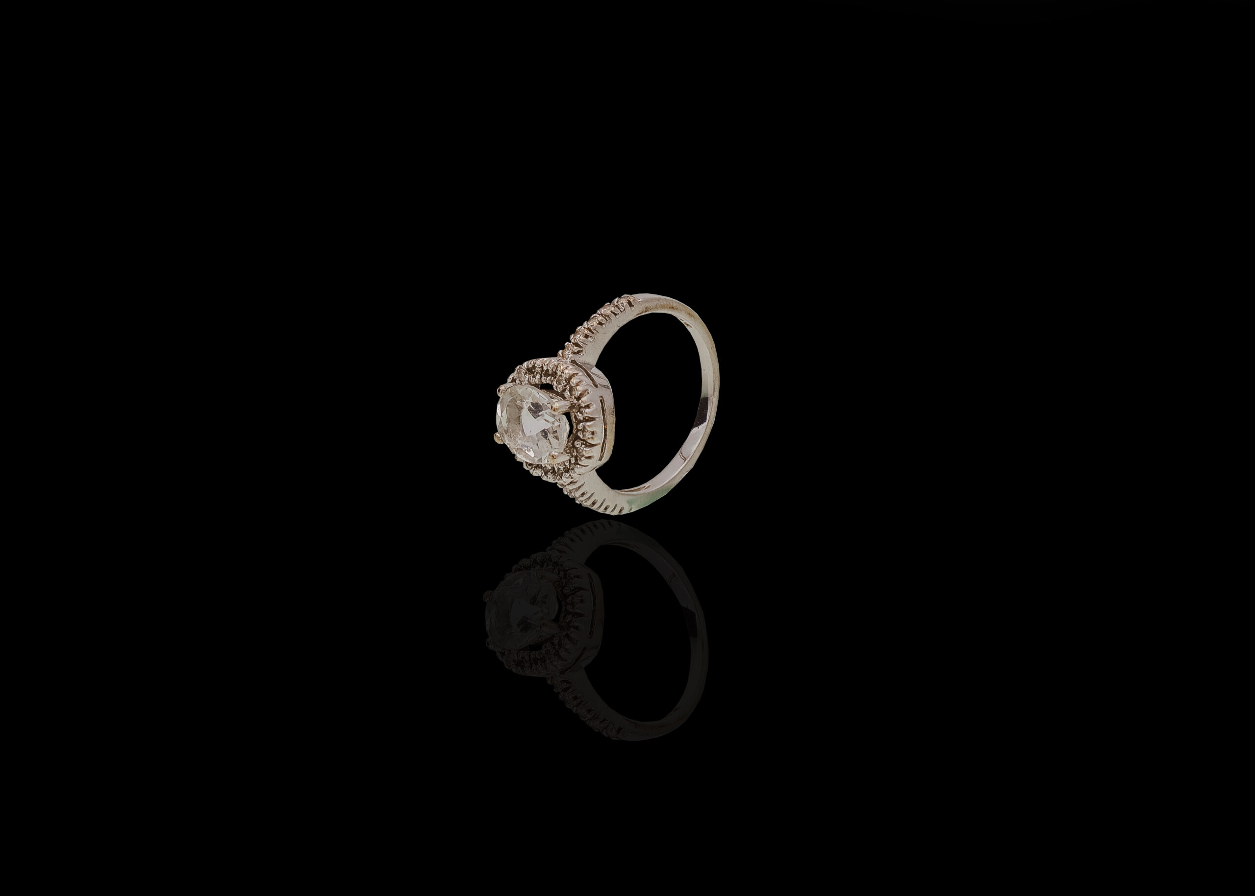 CI0001123 - 3.8 grams 9 carat White Gold Cubic Zirconia and Diamond Halo Ring