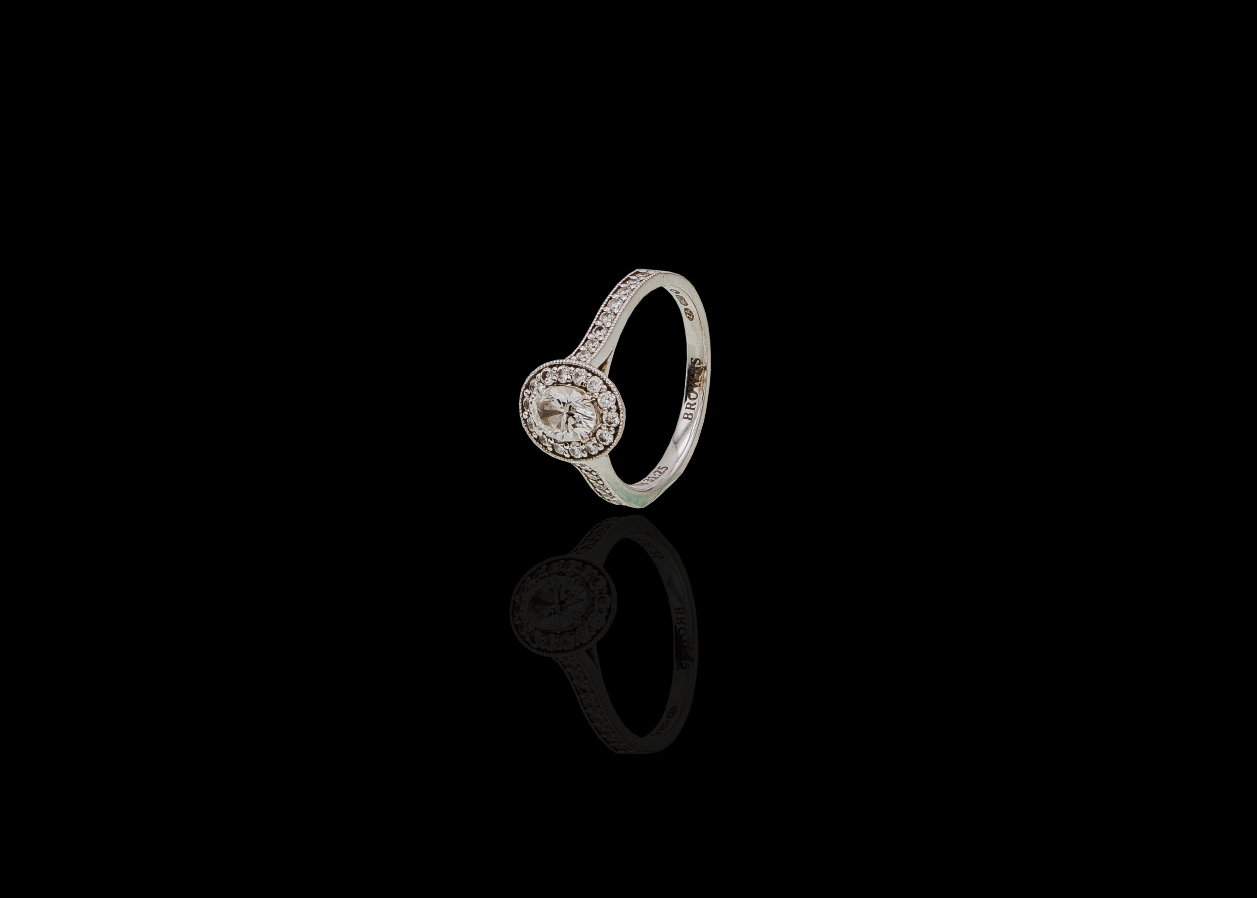 CI0001195 - 3.7 grams 18 carat White Gold Diamond Browns Halo Engagement Ring