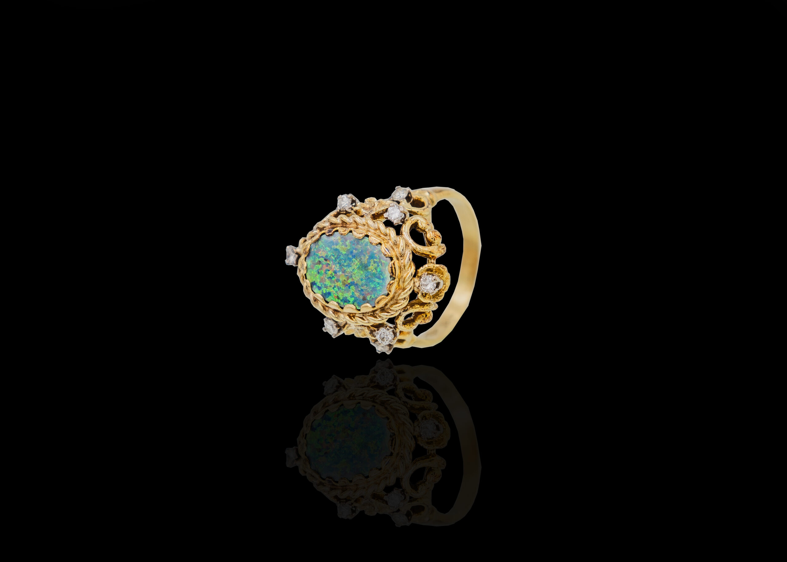 CI0001014 - 10 grams 18 carat Yellow Gold Opal and Diamond Ring